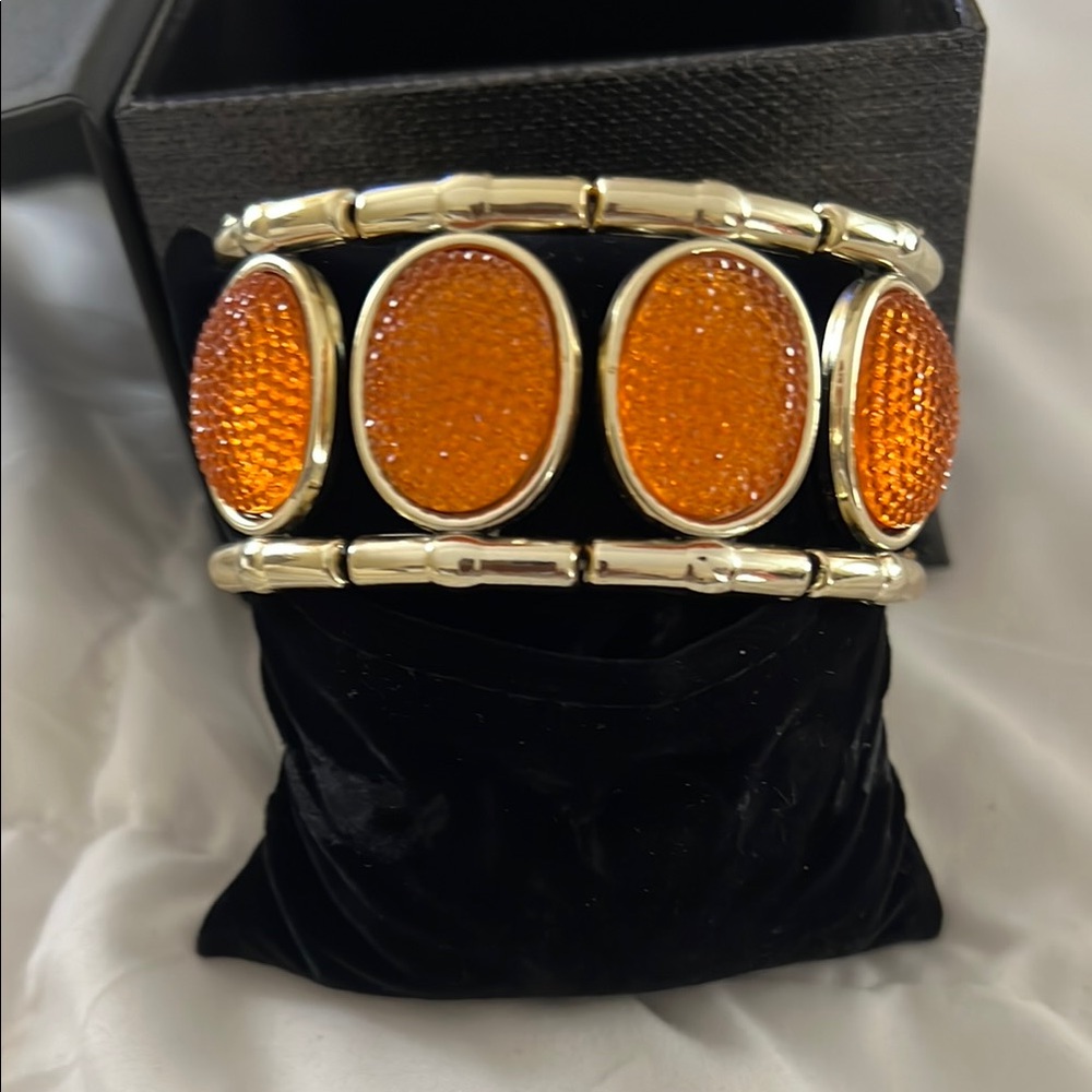 Elegant Gold and Orange Bracelet
